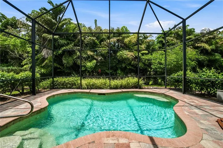Enjoy peaceful preserve views from the screened lanai