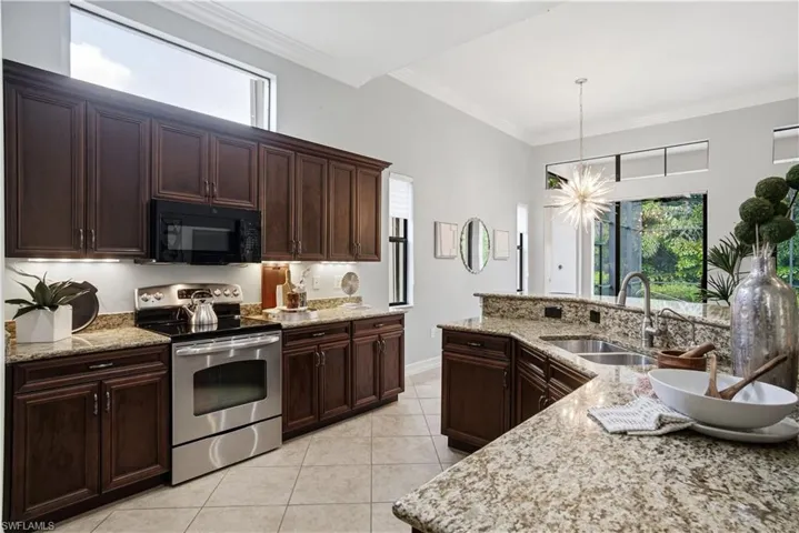 Functional kitchen layout with spacious prep areas