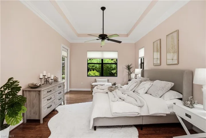 Light-filled primary bedroom with serene ambiance