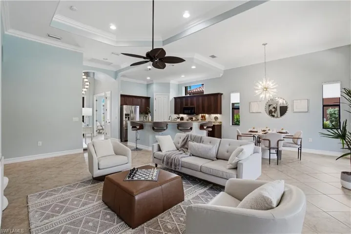 Elegant gathering space overlooking the screened lanai