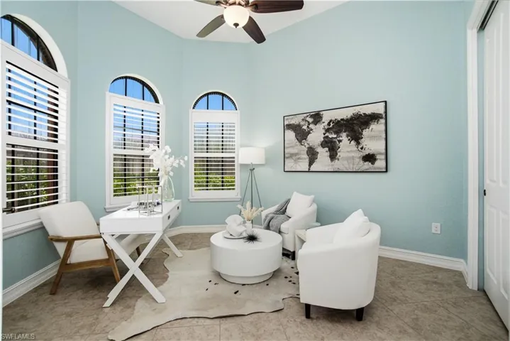 Three beautiful bright windows allow light to pour into the third bedroom that is currently set up as a private office with its ideal location, adjacent to the front door.