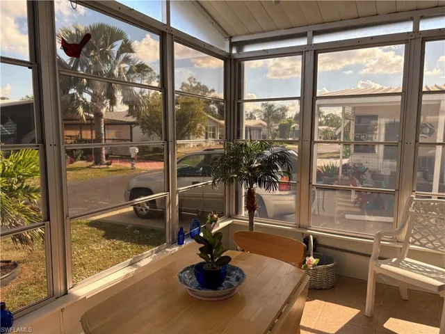 Sunroom with lofted ceiling