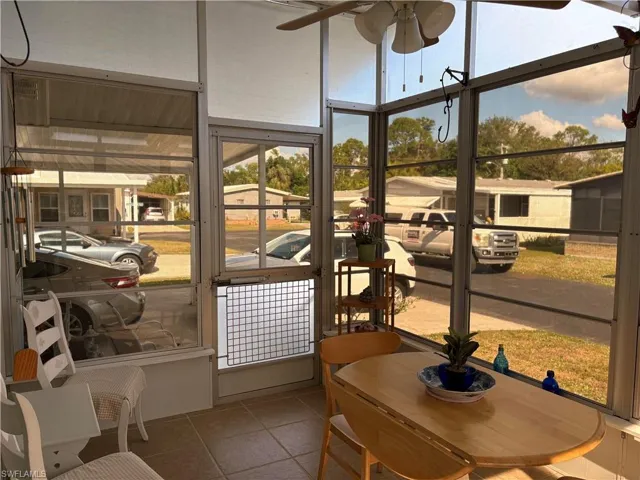 Sunroom with ceiling fan