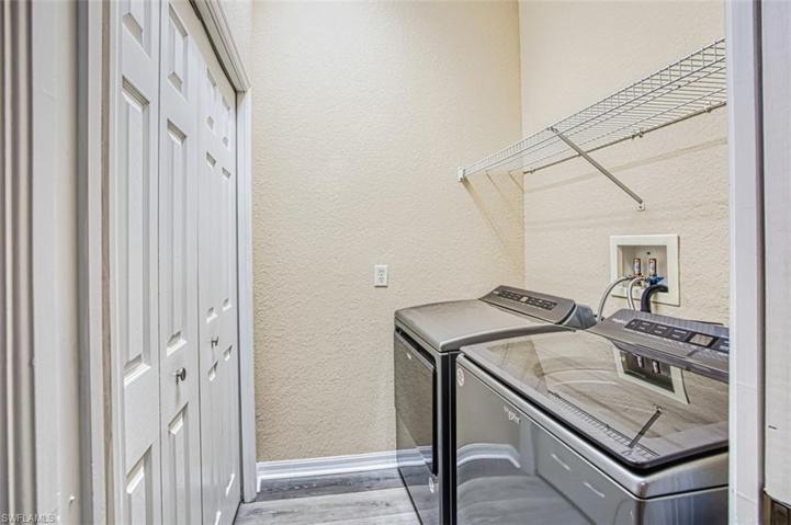 Laundry Room with storage closet