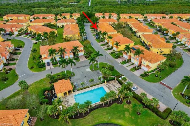 Aerial view of unit and community pool.  Just a short walk.