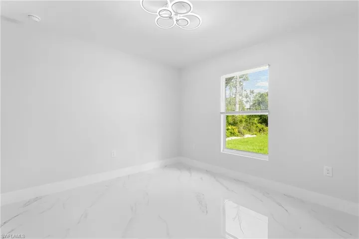 1077  Merry E ST, Lehigh Acres, FL 33974