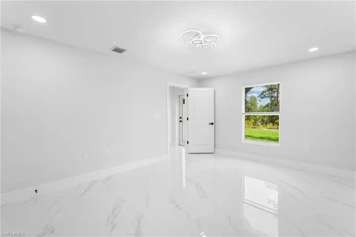 1077  Merry E ST, Lehigh Acres, FL 33974