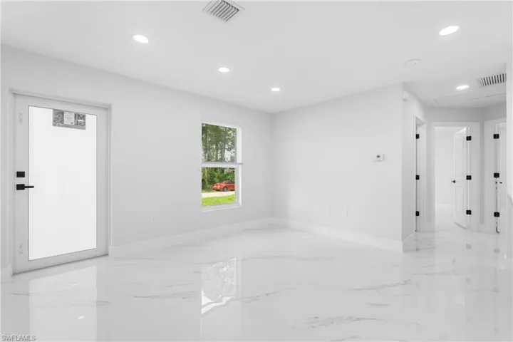 1077  Merry E ST, Lehigh Acres, FL 33974