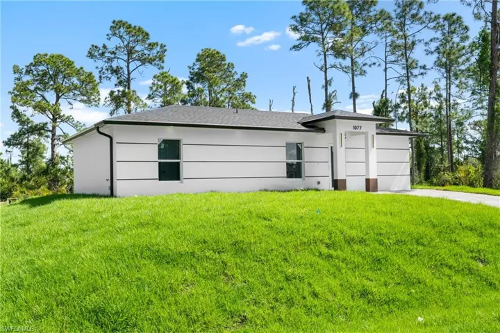 1077  Merry E ST, Lehigh Acres, FL 33974