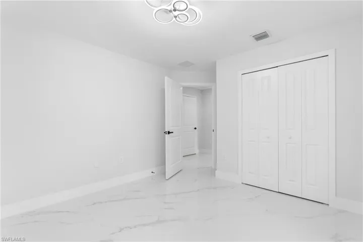1077  Merry E ST, Lehigh Acres, FL 33974