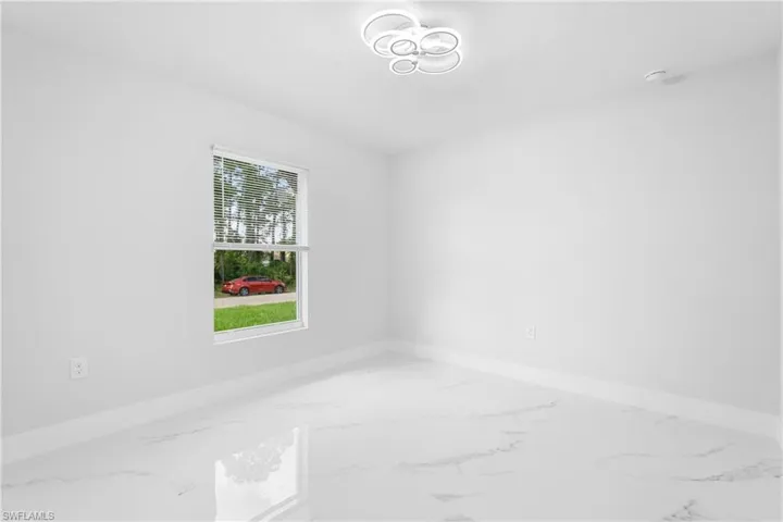 1077  Merry E ST, Lehigh Acres, FL 33974