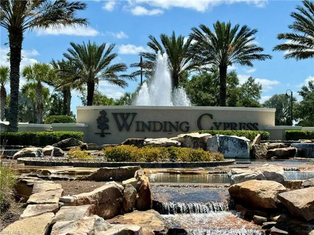 Beautiful Winding Cypress Foutain in Front