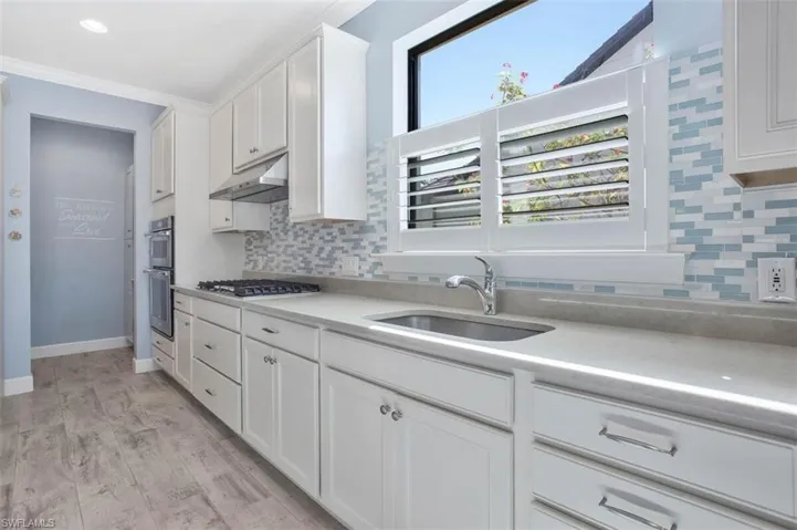 Large single Sink and Cafe Shutters