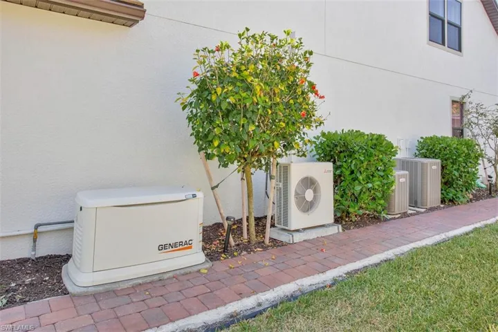 Right side of house, path to Lania , Generator and split A/C