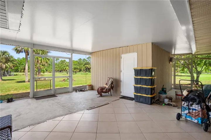 Patio featuring storage room used as bedroom