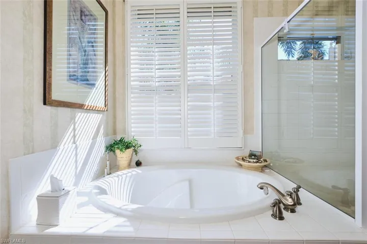 Full bathroom featuring a garden tub