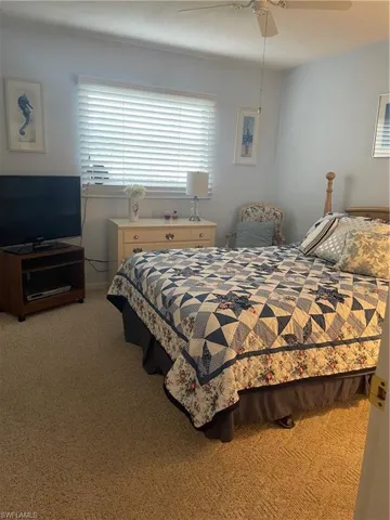 Bedroom featuring a ceiling fan