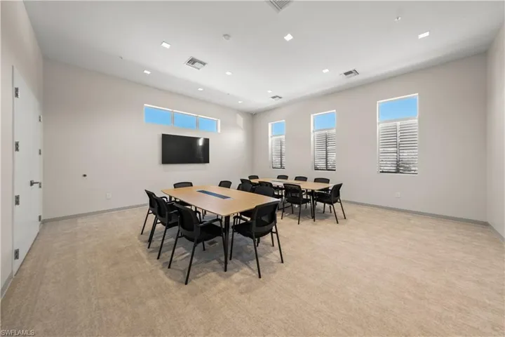 Dining space with light carpet