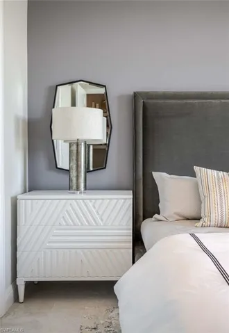 Bedroom featuring baseboards