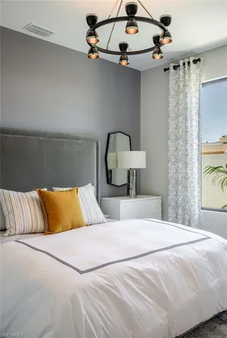 Bedroom with a chandelier