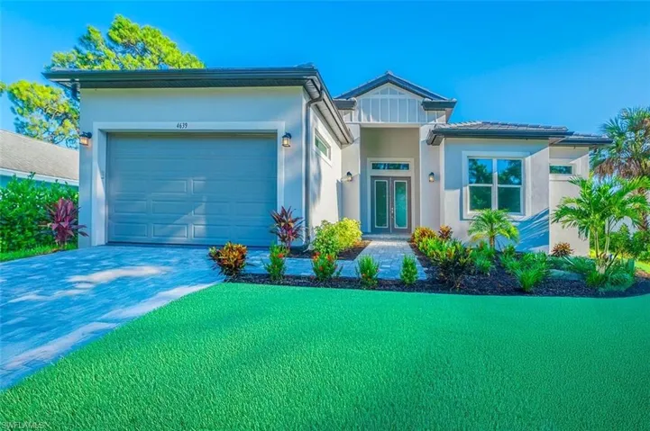 View of front of home with a garage