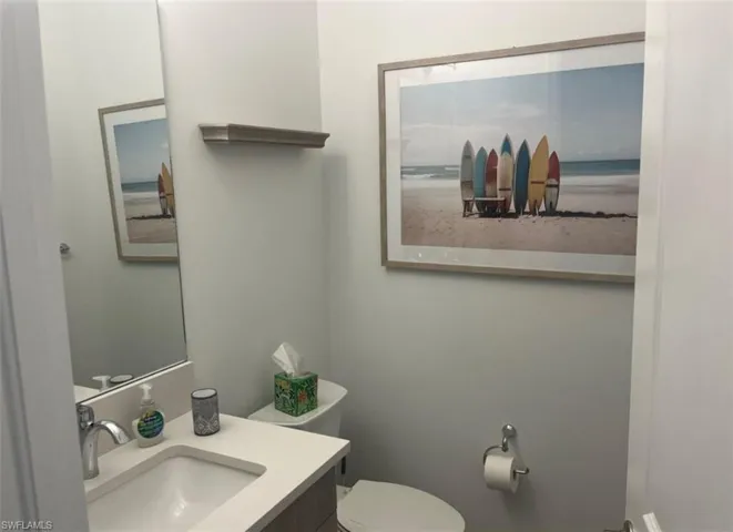 Bathroom with vanity and toilet