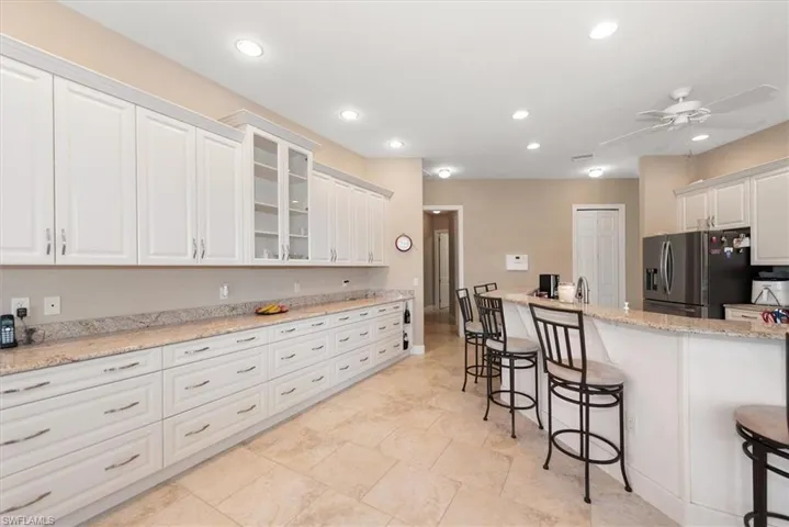 Wow!!! Look at all the additional storage in the kitchen. This is a chefs dream!