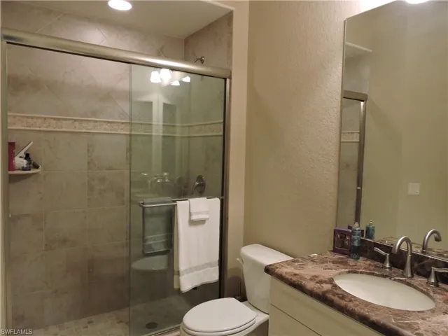 Guest bathroom with tile shower