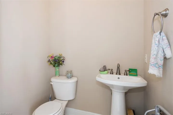 Guest half bath is located in the lanai area. The seller had air condition installed to this bath for better climate control as well.