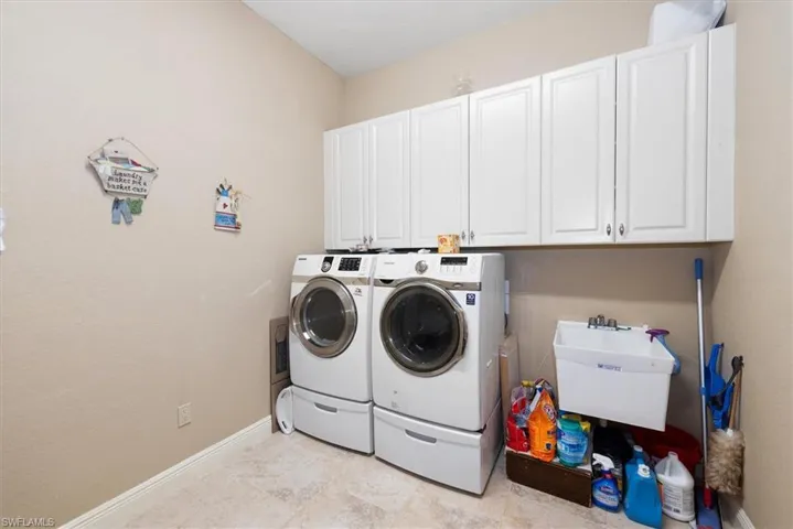The laundry room is huge 11'6" x 8'6"