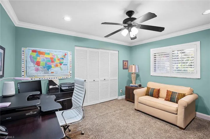 While the owners use the room as an office, with a closet and fold-out sofa, it doubles and a third bedroom.