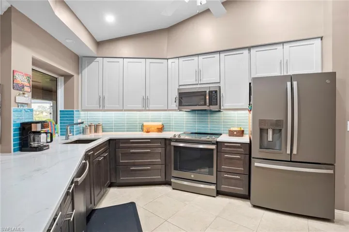 Kitchen location make for easy access to formal dining area and other eating areas, inside and out.