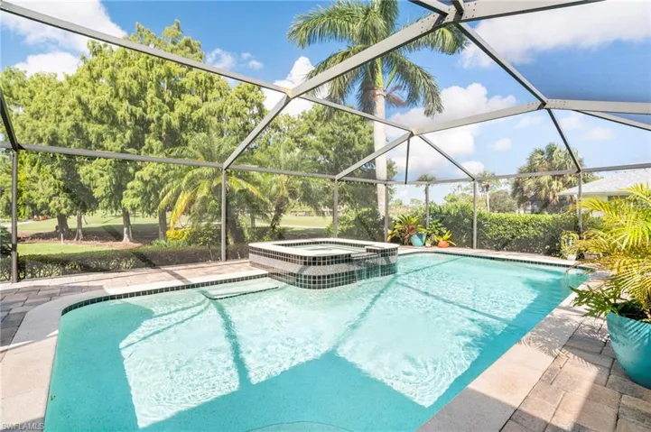 While the home sits near the 16th green of the Royal Palm Golf Club, the extensive landscaping provides privacy for the golfers passing by.