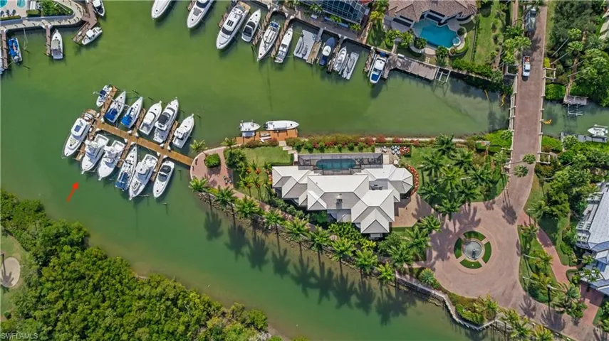 Aerial overview of property's location with a nearby body of water