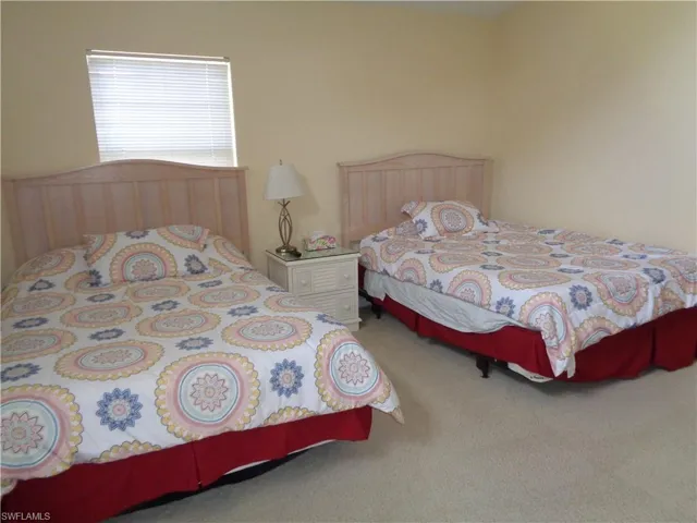 Bedroom with carpet