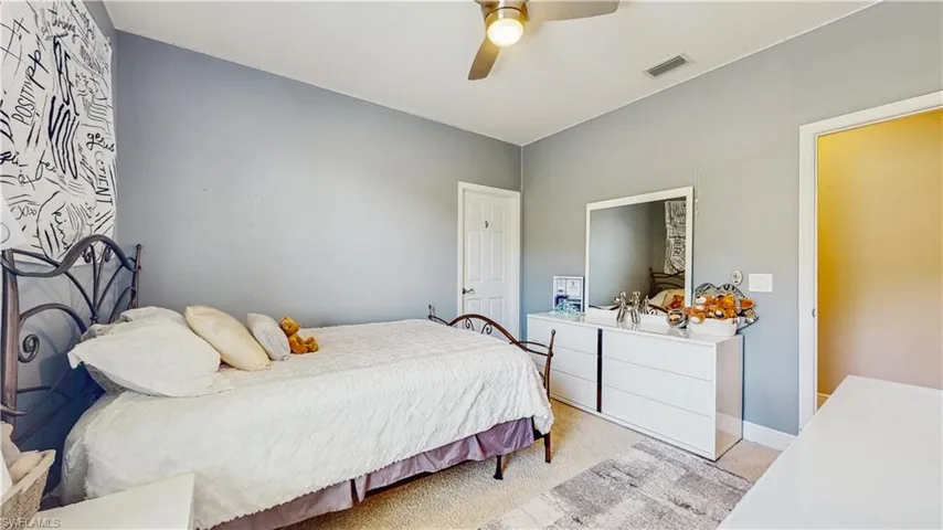 3RD BEROOM ON 2ND FLOOR WITH WALK-IN CLOSET, PLUSH CARPETING, SOFT TONE WALL COLORS, FAN/LIGHT