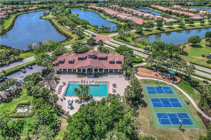 AERIAL VIEW OF FRONT OF CLUBHOUSE, POOL & GRILL AREA