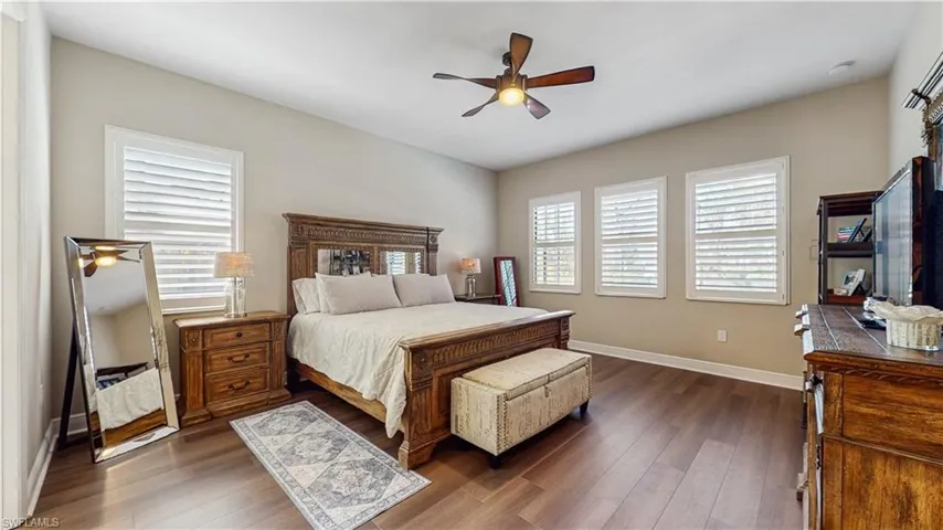 SPACIOUS/HUGE MASTER BEDROOM WITH KING SIZE BED, WINDOWS FOR NATURAL LIGHTING, LAMINATE FLOORIN, FAN/LIGHTING