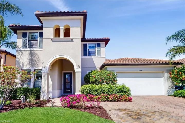MEDITERRANEAN/SPANISH-STYLE HOME, 2 CAR GARAGE, EXTRA DRIVEWAY W DECORATIVE PAVER, STUCCO & TILE ROOF.