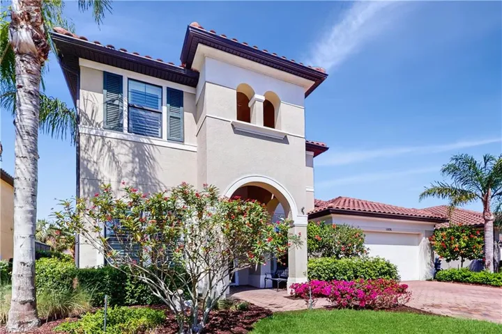 MEDITERRANEAN/SPANISH-STYLE HOME, 2 CAR GARAGE, EXTRA DRIVEWAY W DECORATIVE PAVER, STUCCO & TILE ROOF. MATURE LANDSCAPE.