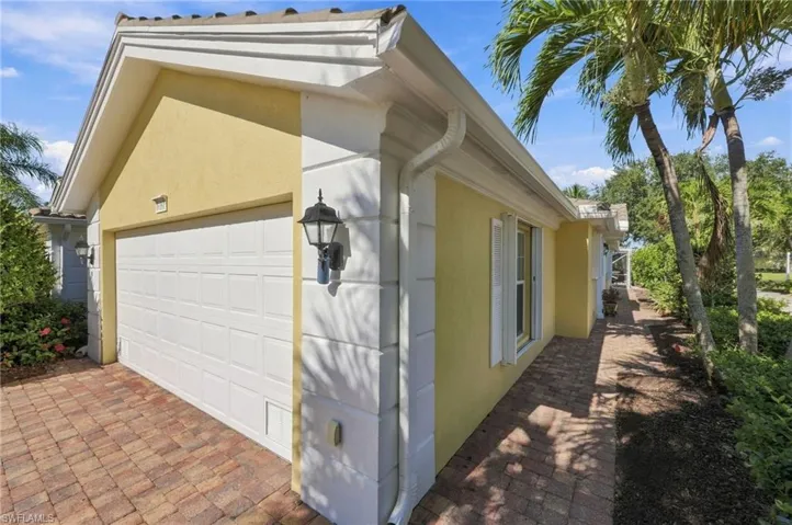 Side paver walkway to front door
