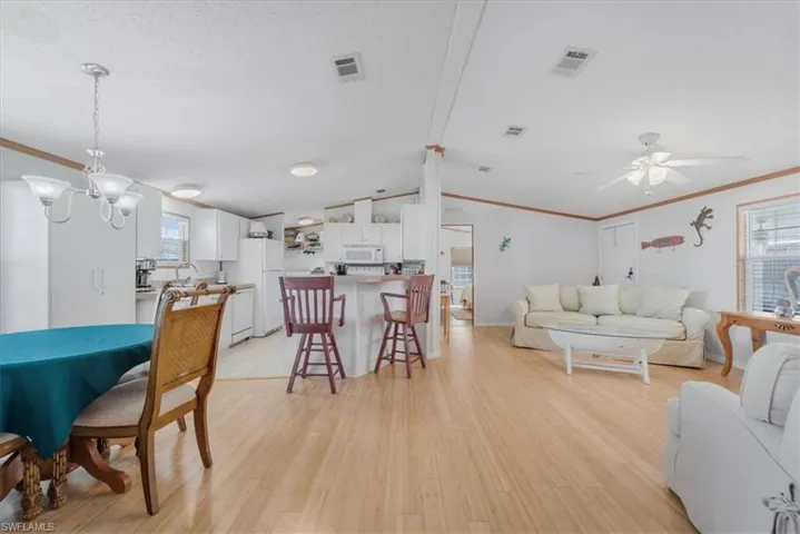 Open-concept, spacious floor plan with a well-appointed kitchen and breakfast bar—ideal for everyday living and entertaining