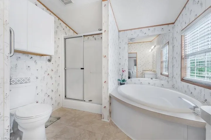 Primary Bathroom with Soaking Tub and Walkin Shower