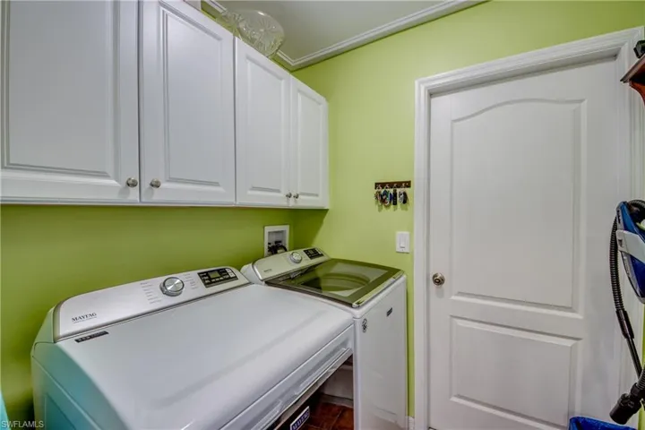 Laundry area featuring separate washer and dryer