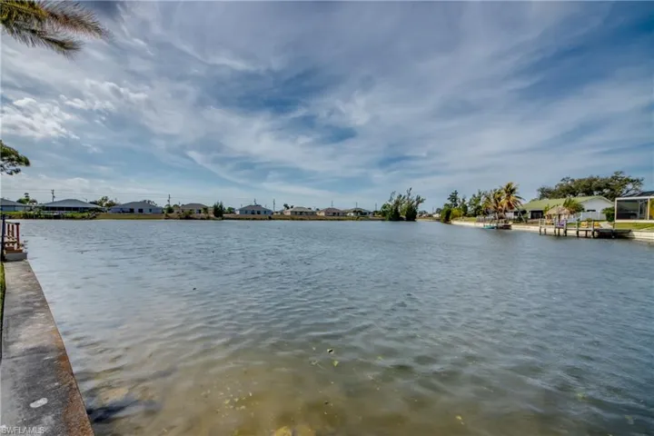 Water view featuring nearby suburban area