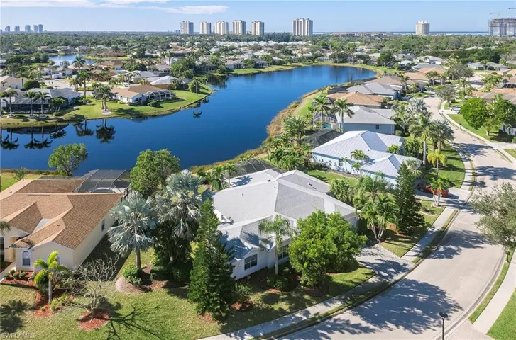 View of urban area featuring nearby suburban area and a large body of water