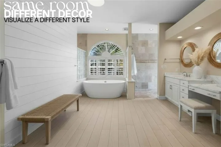 Full bath featuring walk in shower, vanity, a freestanding bath, light wood-type flooring, and recessed lighting
