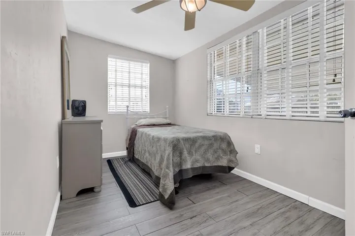Bedroom featuring baseboards, , and ceiling fan