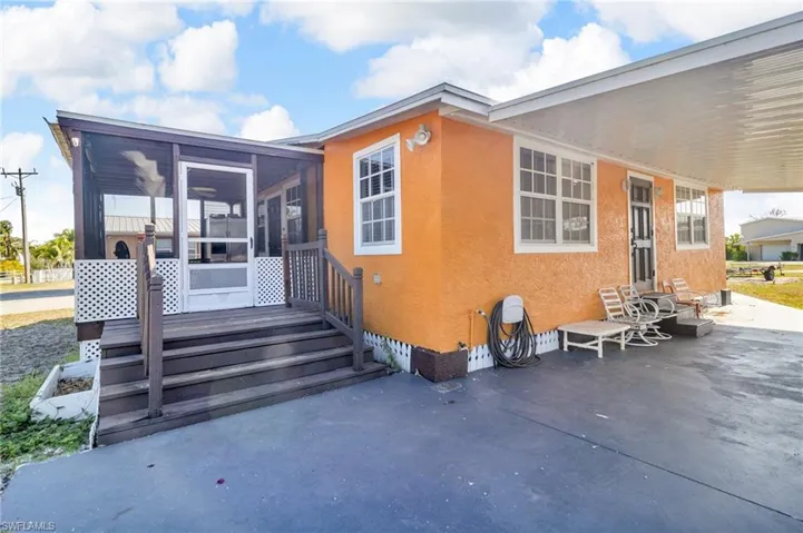 Rear view of property featuring a patio, , and stucco siding