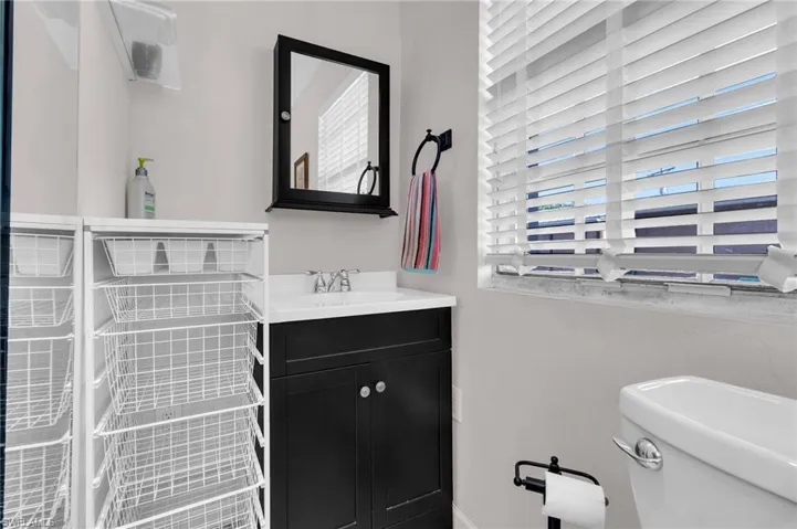full bath featuring toilet and vanity